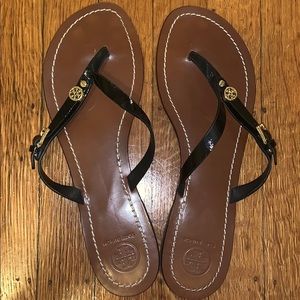 Tory Burch black leather flip flops